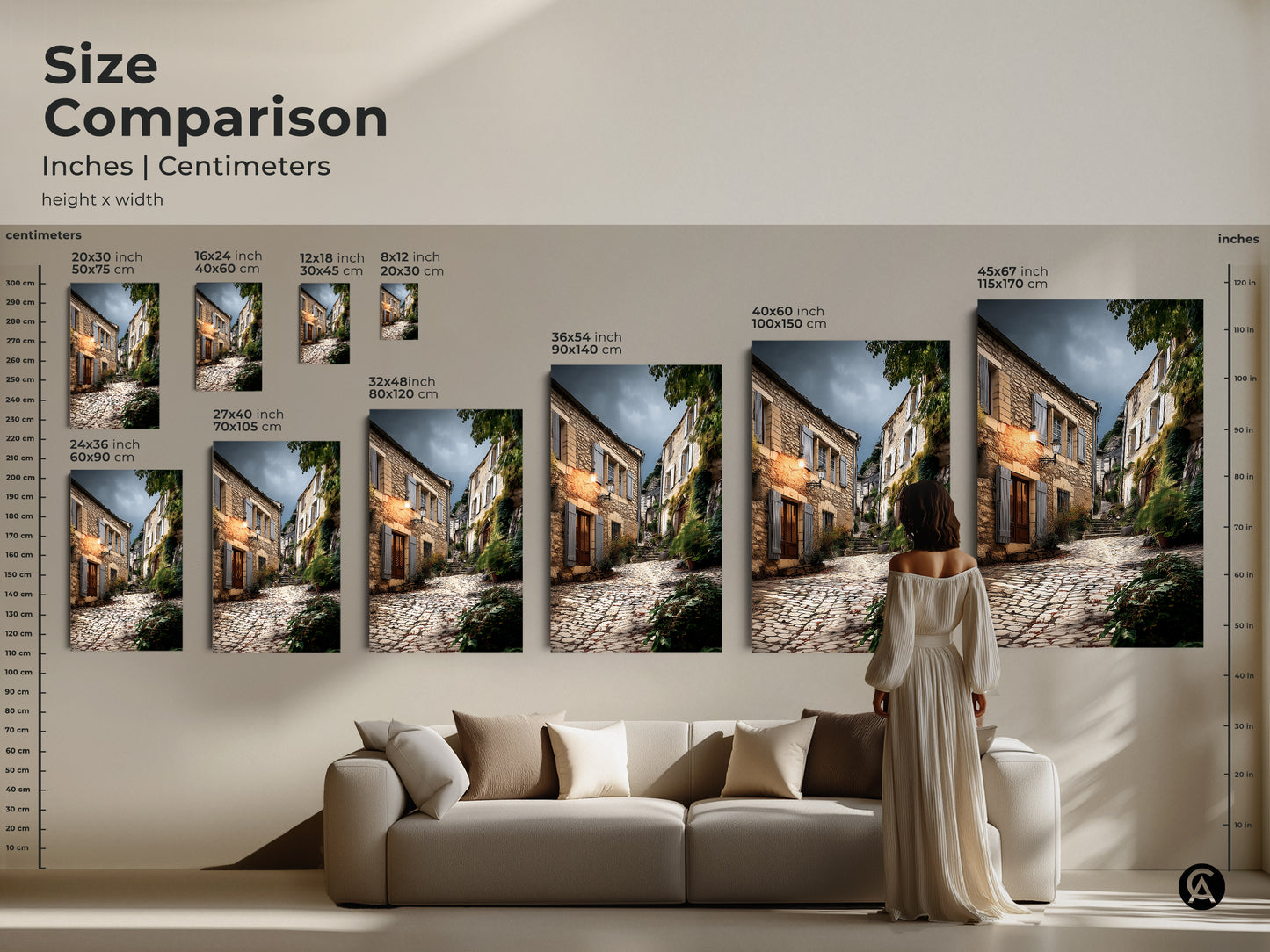 Size comparison of European village art prints. See how different sizes fit above a sofa. Available in inches and centimeters. Rustic beige and brown tones create a cozy atmosphere. Perfect for adding old-world charm to your home decor. Ideal for travel lovers and countryside painting print.