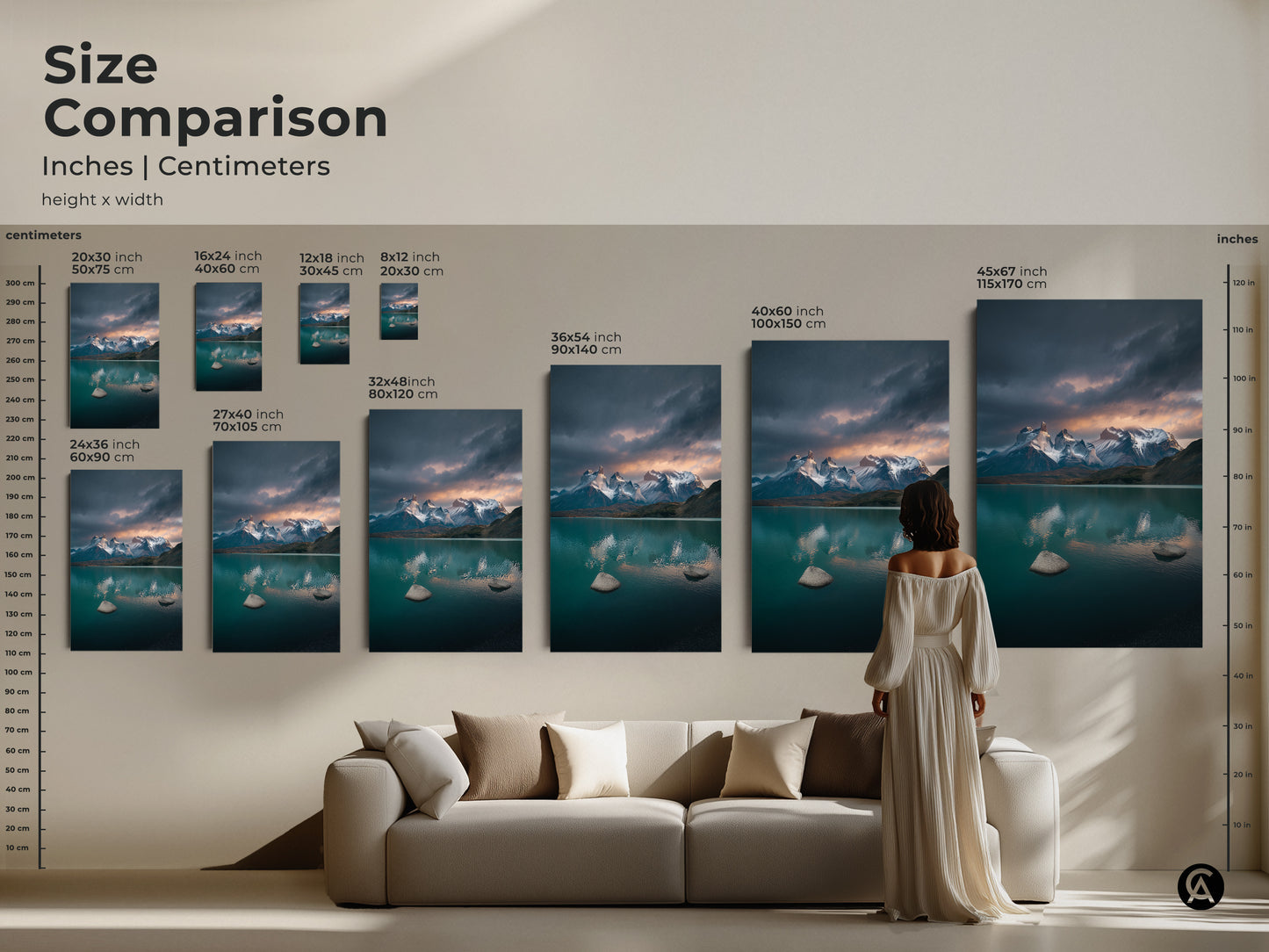 Size comparison of a teal lake and mountain artwork in inches and centimeters. Available as canvas or poster prints. Sizes range from 20x30 cm to 115x170 cm. See how this scenic landscape art fits above a sofa. Perfect for adding contemporary nature decor to your living room.
