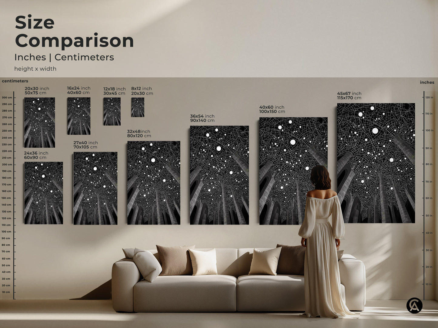 Size comparison of the black and white geometric abstract wall art. See it in inches and centimeters. A woman sits on the couch next to the art hanging on the wall. Available in multiple sizes.