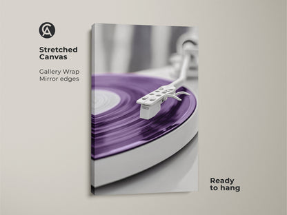 Stretched canvas print of a purple vinyl record. This abstract turntable artwork offers a minimalist mid-century modern touch. Ideal for a music room or home office wall art. Gallery wrapped with mirrored edges. It comes ready to hang and enjoy.