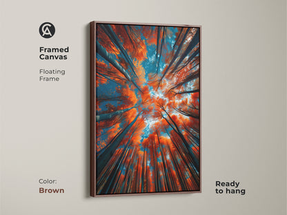 A framed canvas artwork with a brown floating frame. The art features tall trees. Looking up into the sky. The orange leaves and blue sky create a nature scene. This ready-to-hang piece brings warmth to your space. Add to cart