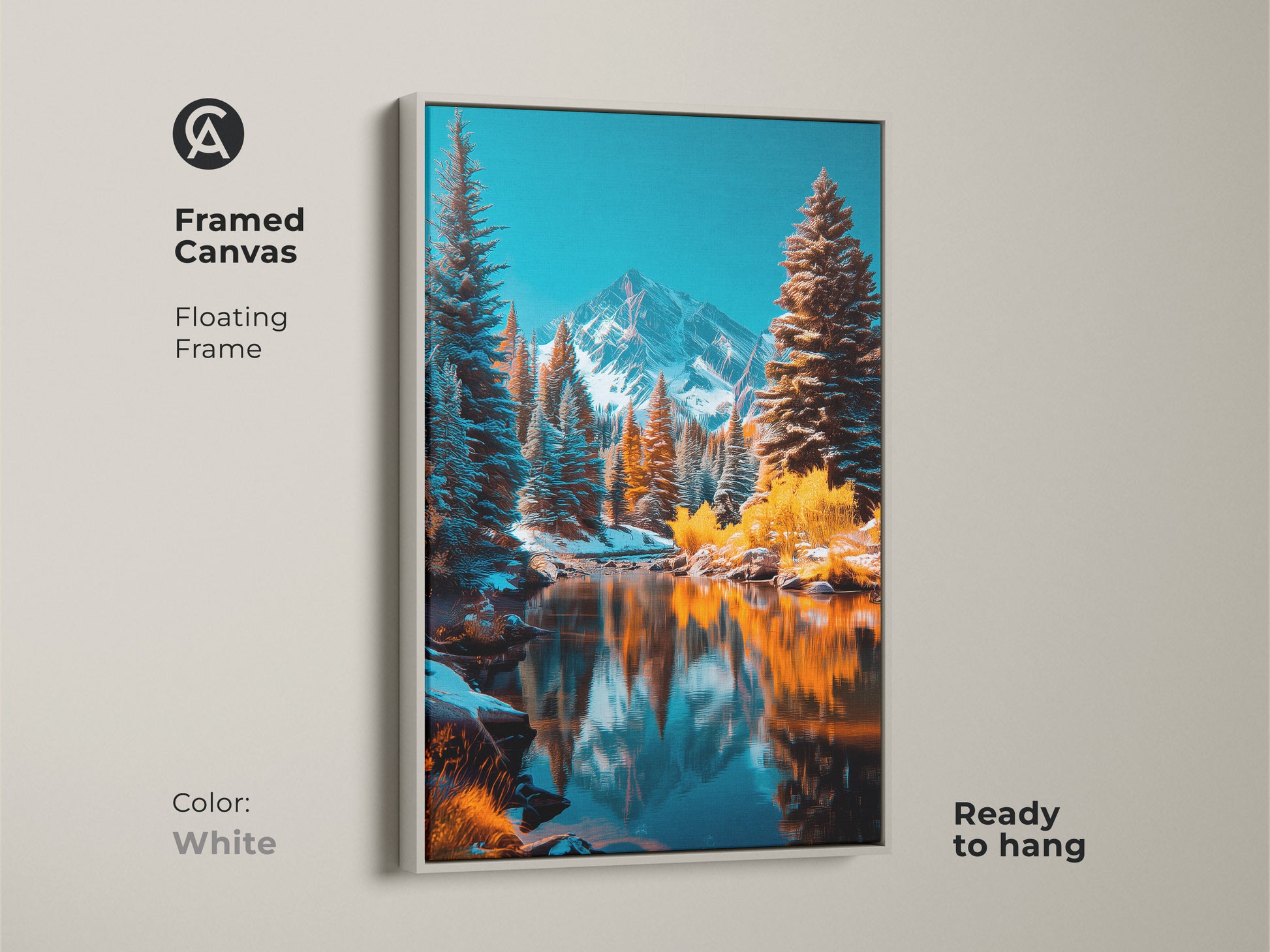 Framed canvas art of a winter mountain scene. The floating frame is white. The canvas is ready to hang. This artwork shows a stunning mountain landscape with snow covered peaks and a reflective lake.
