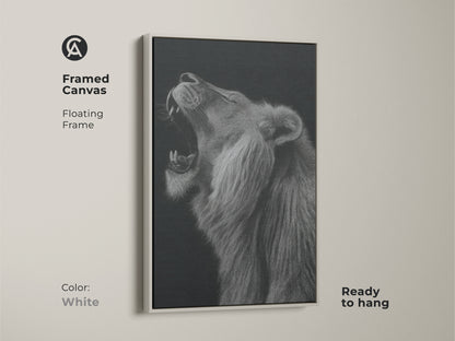 Framed canvas featuring a clean white floating frame. This monochrome canvas art is ready to enhance your walls. Decorate with wildlife wall decor featuring a roaring lion artwork. The black and white animal portrait print offers a modern art style. Elevate your home with this canvas.