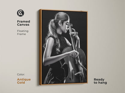 Framed canvas features a cellist in monochrome. The artwork has a floating frame in antique gold. Ready to hang this contemporary piece adds elegance to any room. A sophisticated gift for music enthusiasts and art collectors.
