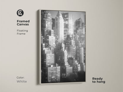 This framed canvas features a floating frame in white. The black and white skyline artwork is ready to hang. Add a touch of modern elegance to your home with this NYC art.