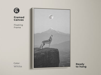 White framed canvas displaying a wolf howling at the moon. Minimalist landscape canvas for modern decor. A thoughtful nature lovers gift idea ready to hang.