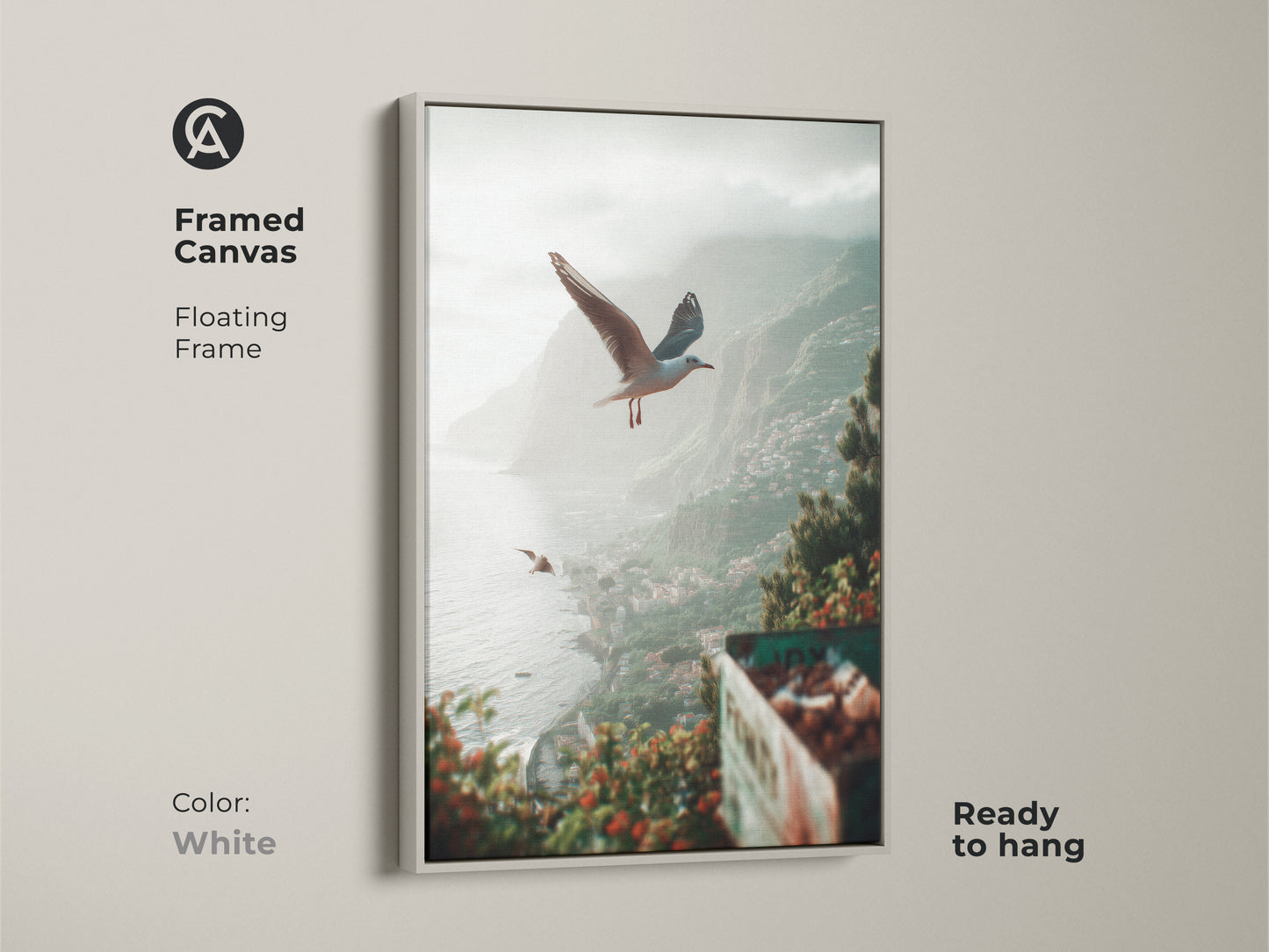 Framed in white canvas featuring teal green grey coastal artwork with seagulls over a seaside town. This beach landscape art print offers a tranquil ocean view. Ready to hang this piece brings artistic sea view and coastal vibes to any room making it a lovely housewarming beach art.