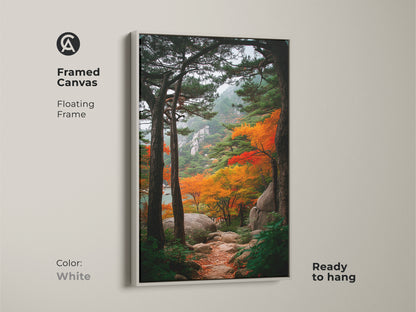 Framed canvas art showcasing a mountain path in autumn. The white floating frame provides a clean look. This ready-to-hang piece brings nature indoors. It's a stylish choice for wall decoration.