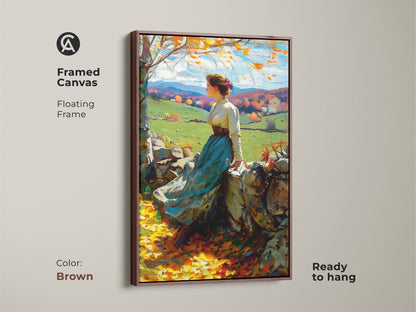 A framed canvas artwork features a woman. She is sitting on a stone wall viewing an autumn landscape. The floating frame enhances the artwork's aesthetic. The brown frame brings warmth to the piece. The art is ready to hang adding a cozy artistic element to your home.