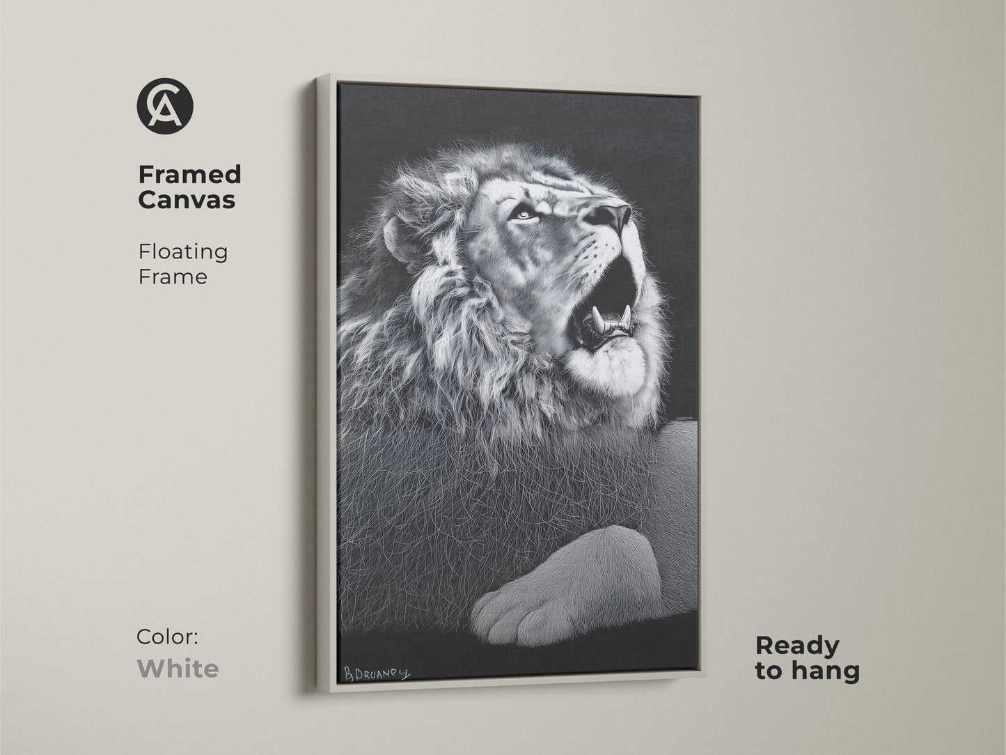 White framed monochrome lion canvas. This floating framed wildlife decor is ready to hang. It's suited for a contemporary bedroom or office. Bring a touch of the savanna wildlife to your walls.