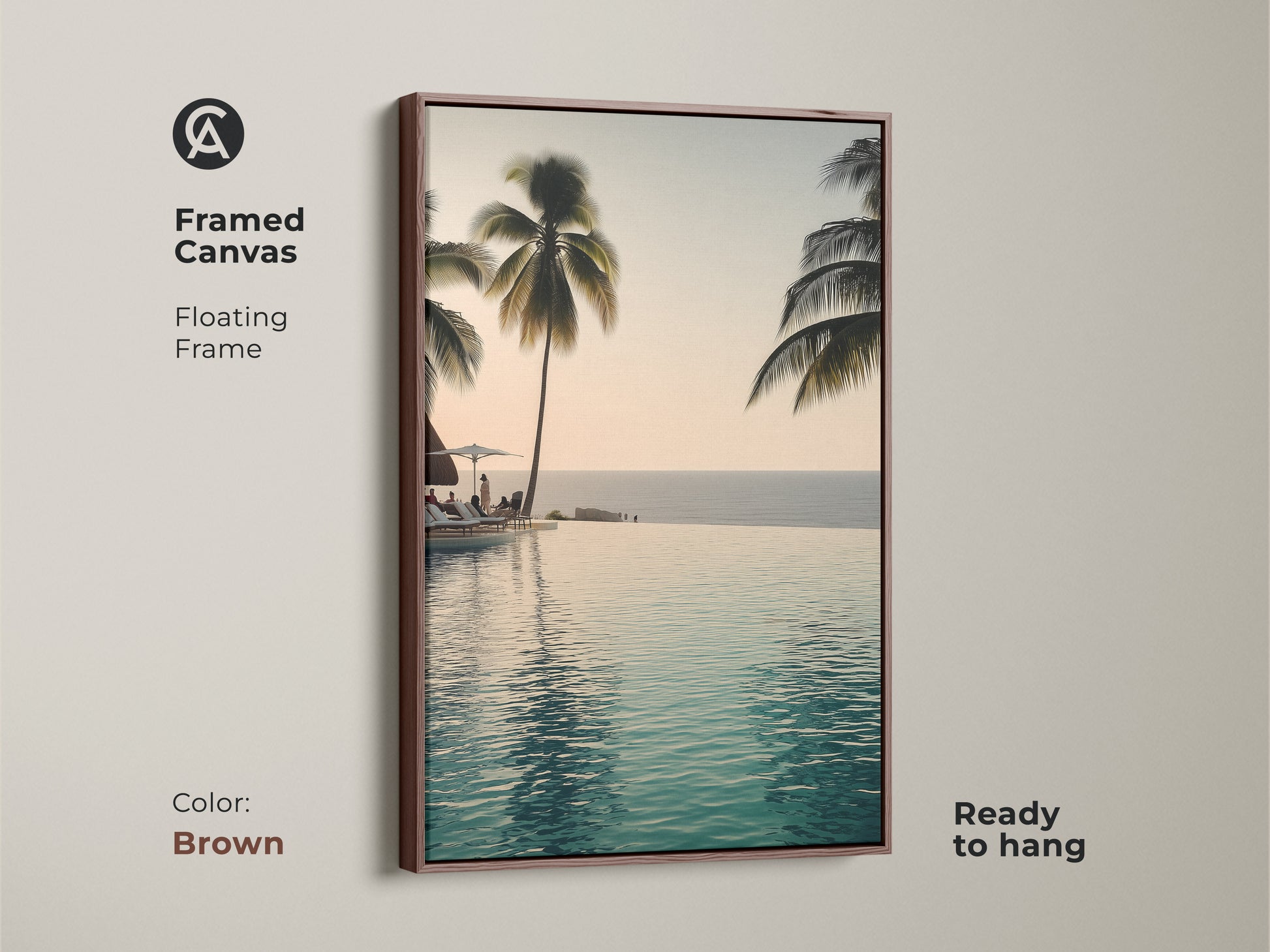 This framed canvas features an infinity pool with palm trees. A floating frame in brown makes it ready to hang. Enjoy a coastal ocean view with this tropical beach landscape artwork.