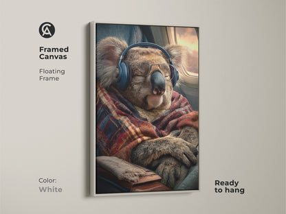 A framed canvas in white shows a koala on an airplane. It is a delightful piece for animal lovers ready to hang and adds a touch of humor to any space. Gift this quirky koala artwork to frequent flyers and bring cozy animal vibes to their home or office today