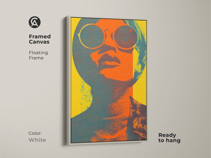 Framed canvas of pop art woman in a white floating frame ready to hang. A retro portrait canvas featuring abstract sunglasses art. The orange teal and yellow colors make it eclectic wall art. Vintage style artwork with bold colors. It is a great gift for retro art lovers. Modern face art for unique home decor.