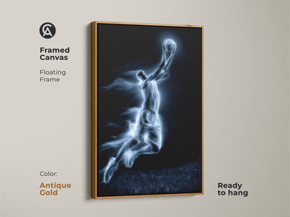 Framed canvas featuring a basketball player dunking. This artwork has a floating antique gold frame. The piece is ready to hang. Great sports art for any room. Purchase it now