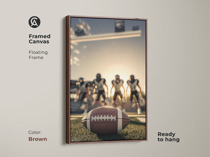Framed canvas with a brown floating frame showcasing American Football artwork. The art is ready to hang. It captures a football on the field with players. This sports action print is great for a man cave. It is a perfect gift for a football fan.