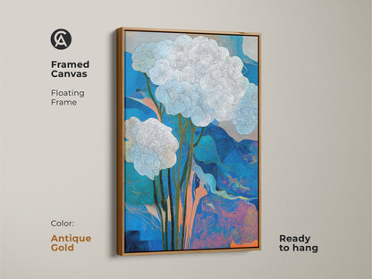 Framed canvas showcasing abstract floral artwork in a floating antique gold frame. The blue and orange botanical print adds a contemporary vibe. It's ready to hang. This botanical abstract print is ideal as a housewarming gift art and gift for plant lovers.