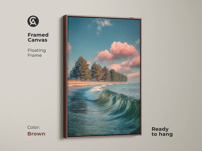 Framed canvas ocean wave art. Floating frame in brown. Coastal landscape artwork shows pine trees on a beach. Ready to hang teal blue seascape brings calming nature art to your home.