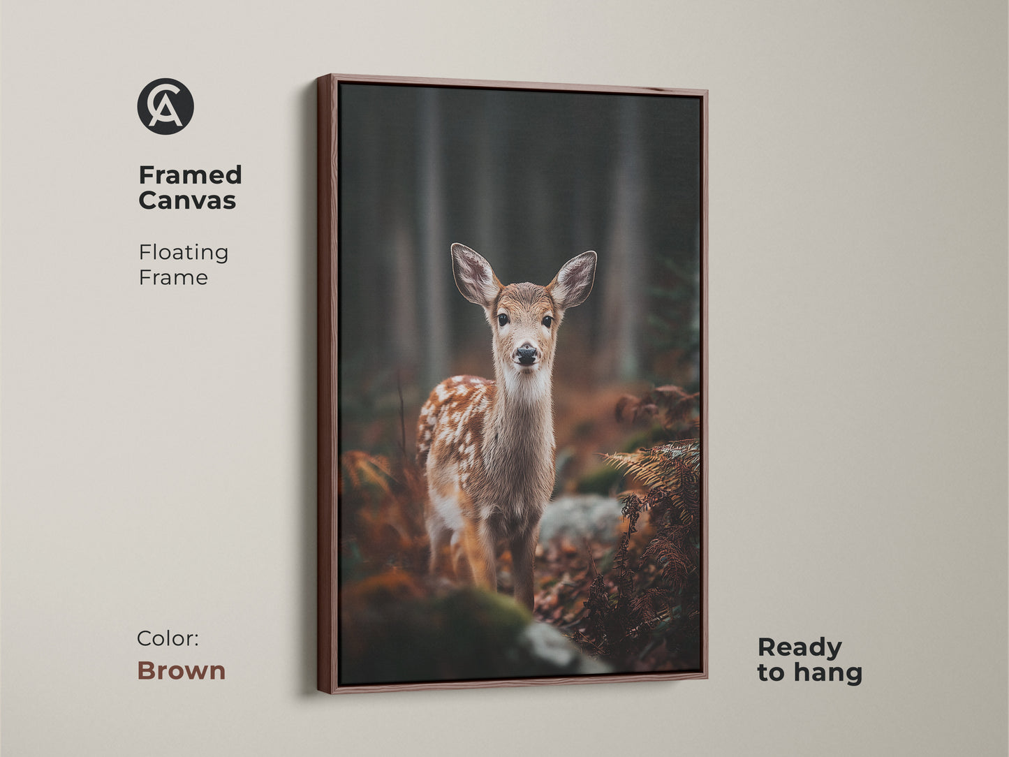 Framed canvas of a fawn in the forest with a brown floating frame. Ready to hang this rustic woodland decor adds charm. Perfect for animal lovers. A beautiful nature inspired housewarming gift.