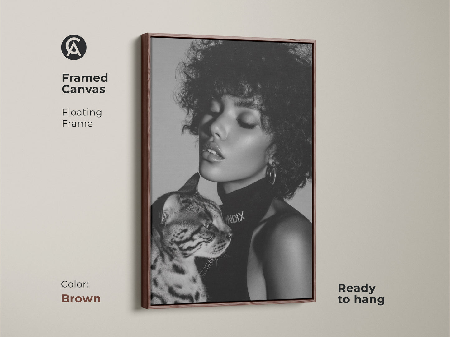 Brown framed canvas art featuring a black and white portrait of a woman and a Bengal cat. The floating frame enhances its contemporary appeal. Ready to hang for easy wall decor. A sophisticated addition to your home.