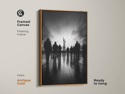 Brighten your space with this framed canvas art in antique gold. The Statue of Liberty takes center stage in this monochrome masterpiece. Silhouetted figures add depth and intrigue. The floating frame adds a touch of vintage elegance. Ready to hang.