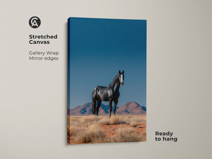 Stretched canvas gallery wrap of a majestic black horse in a desert setting. This ready-to-hang wildlife art print brings nature's beauty to your home. Ideal for modern farmhouse decor. The mirror edges add a contemporary touch.