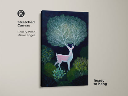 Stretched canvas showcasing pink deer wall art in an indigo forest. This botanical deer artwork adds fantasy animal art vibes to your space. It's ready to hang boho nature decor. The gallery wrap provides mirror edges.