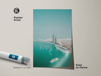Poster print of a teal ocean cityscape. It shows an aerial view of a cruise ship sailboats and a city skyline. This coastal travel artwork is easy to frame. A great travel lover gift idea for modern coastal print enthusiasts.