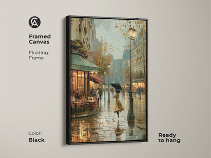 Framed canvas of a rainy Paris cafe scene. The floating frame adds a contemporary touch to this impressionistic cityscape artwork. The black frame enhances the brown blue and yellow tones of this European street scene decor. This ready to hang art is perfect for a living room.