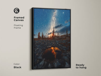 Framed canvas featuring the Milky Way and pine trees with a floating black frame. Ready to hang this astronomy art piece adds a cosmic touch. Perfect deep blue wall art for space exploration decor enthusiasts. This night sky artwork is an ideal astronomy gift for him. Add rustic charm to any room.