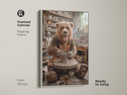 Framed canvas of a bear at a pottery wheel in white. Floating frame offers a clean modern look. Ready to hang craftsmanship wall decor. Ideal for a bright creative space. Terracotta and earthy tones make it a unique pottery gift or kiln art print.
