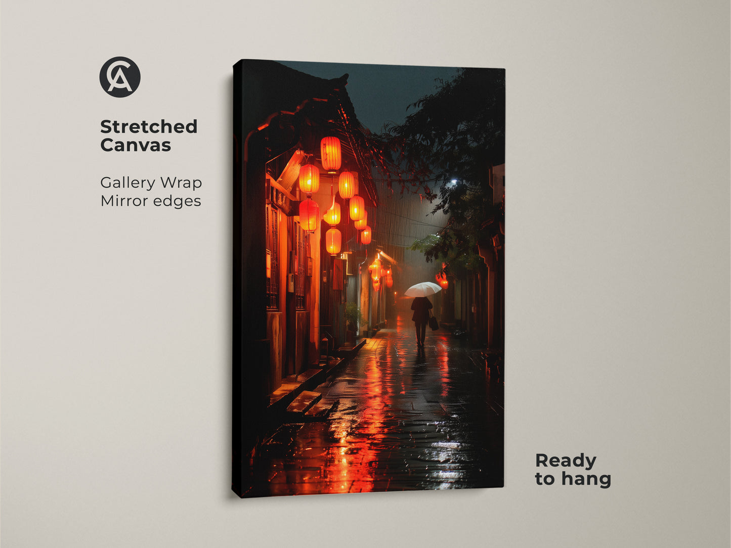 This is a stretched canvas print of a rainy Asian street at night. The gallery wrap and mirror edges give it a modern seamless look. Red lanterns illuminate the scene and a figure with an umbrella walks into the distance. The artwork is ready to hang and enjoy.
