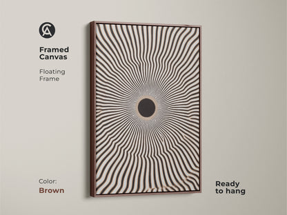 Framed canvas featuring a captivating geometric artwork. The floating frame enhances the black and white radial burst. It is ready to hang. The brown frame complements minimalist home decor. Add a modern touch to any room.