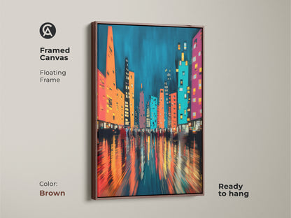 This is a framed canvas art piece featuring a modern abstract cityscape. The brown floating frame beautifully complements the teal blue artwork accented with orange and pink. This piece is ready to hang for easy display and enjoyment.