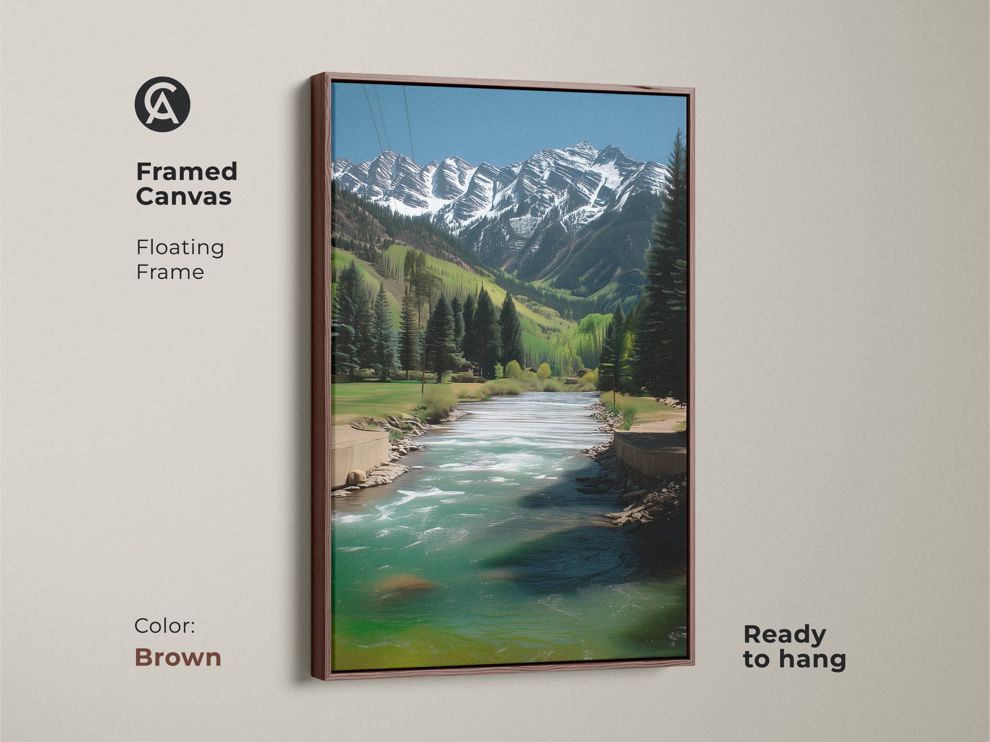 Framed Canvas art with a brown floating frame showcasing a realistic mountain river landscape. The snowy peaks artwork has a teal river. This rustic piece is ready to hang to bring nature indoors.