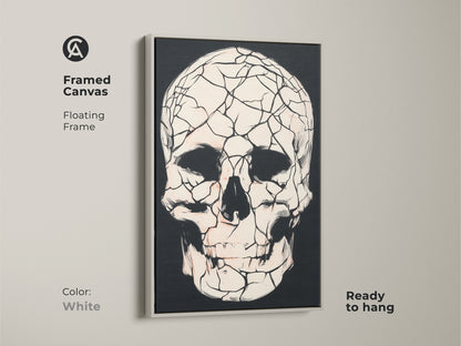 Framed canvas featuring a white floating frame and a gothic cracked skull. Macabre skull art adds a unique touch to home decor. This black red and white artwork is ready to hang. Perfect gothic wall art for your home.