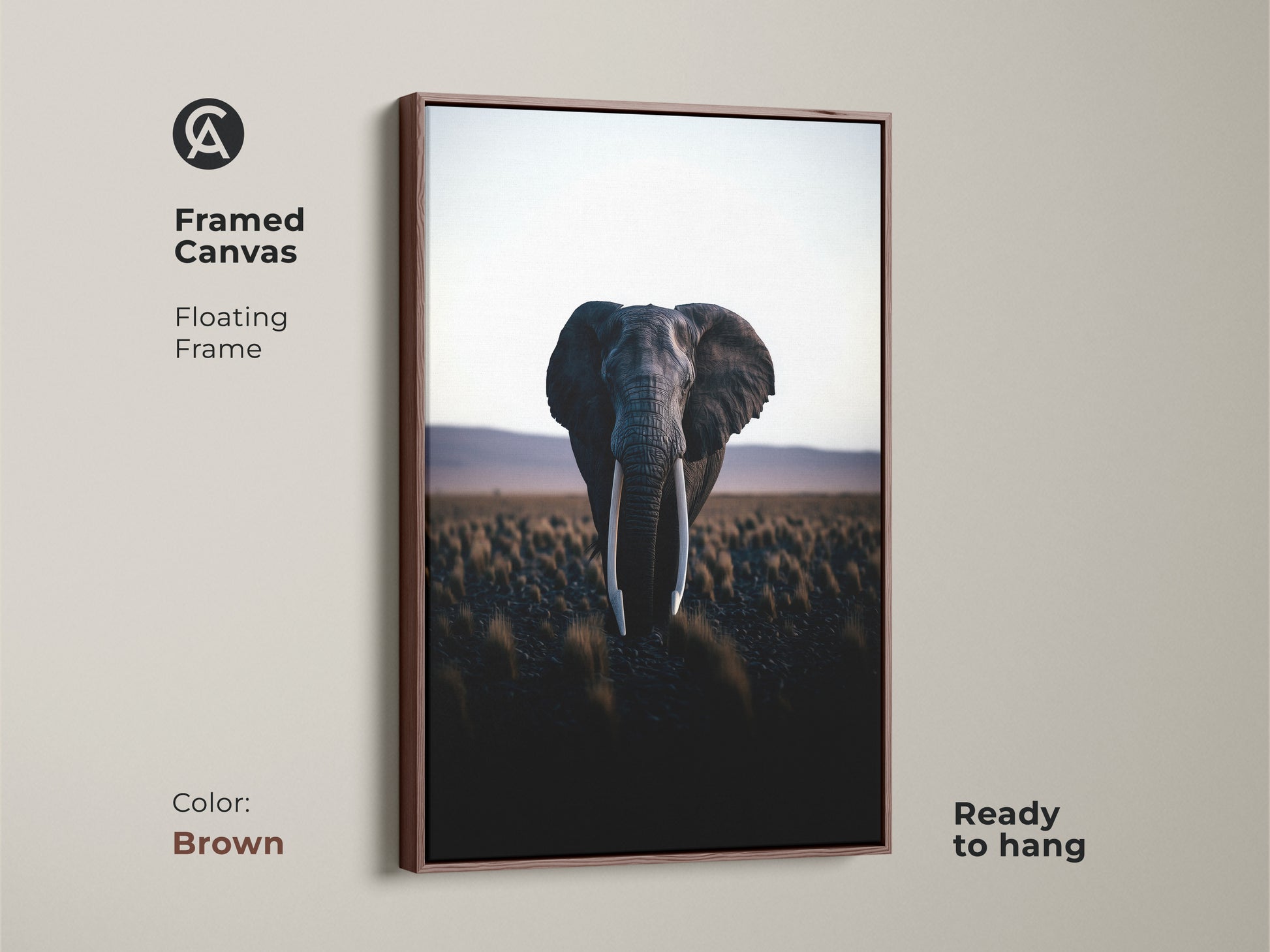 Framed canvas featuring an elephant in its natural habitat. Brown floating frame complements this wildlife artwork. Ready to hang and adds natural elegance to any room. A great housewarming gift.