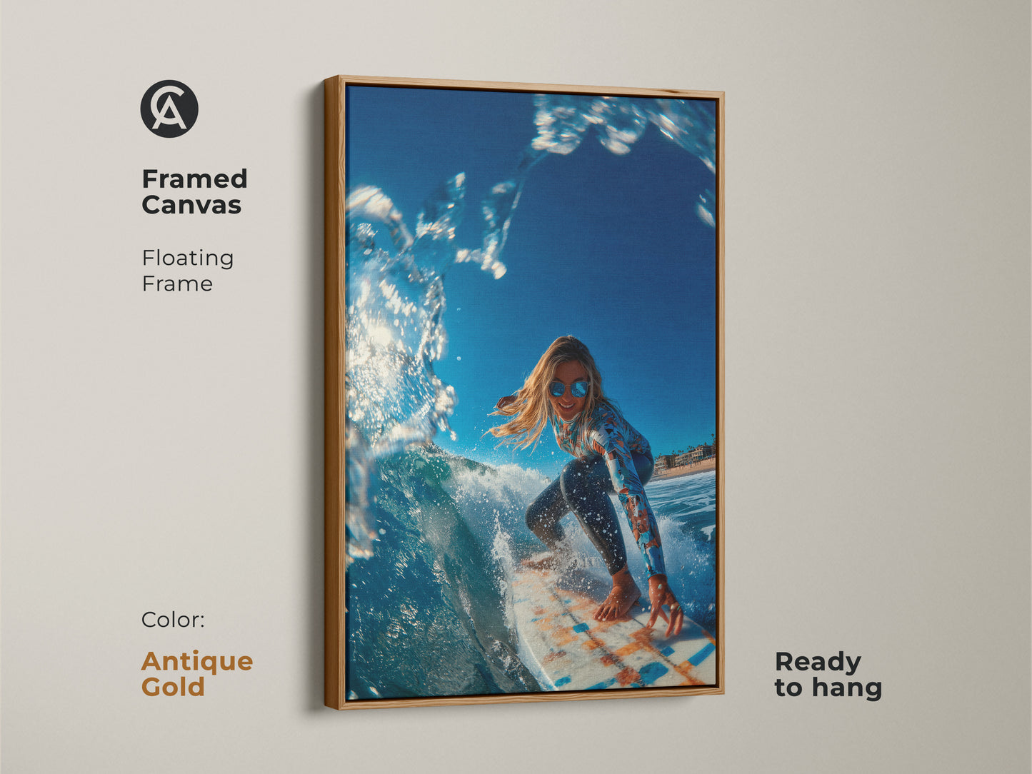 Antique gold framed canvas artwork of a surfer girl riding a wave. The frame is a floating frame. This framed art is ready to hang. The surfer is wearing sunglasses and a long-sleeve swimsuit.