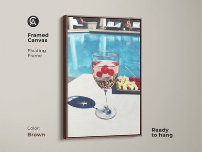Framed canvas art in brown featuring a poolside raspberry rosé cocktail. Floating frame complements the contemporary artwork. Ready to hang this piece brings elegance to dining or bar decor. Modern wall art for wine lovers.