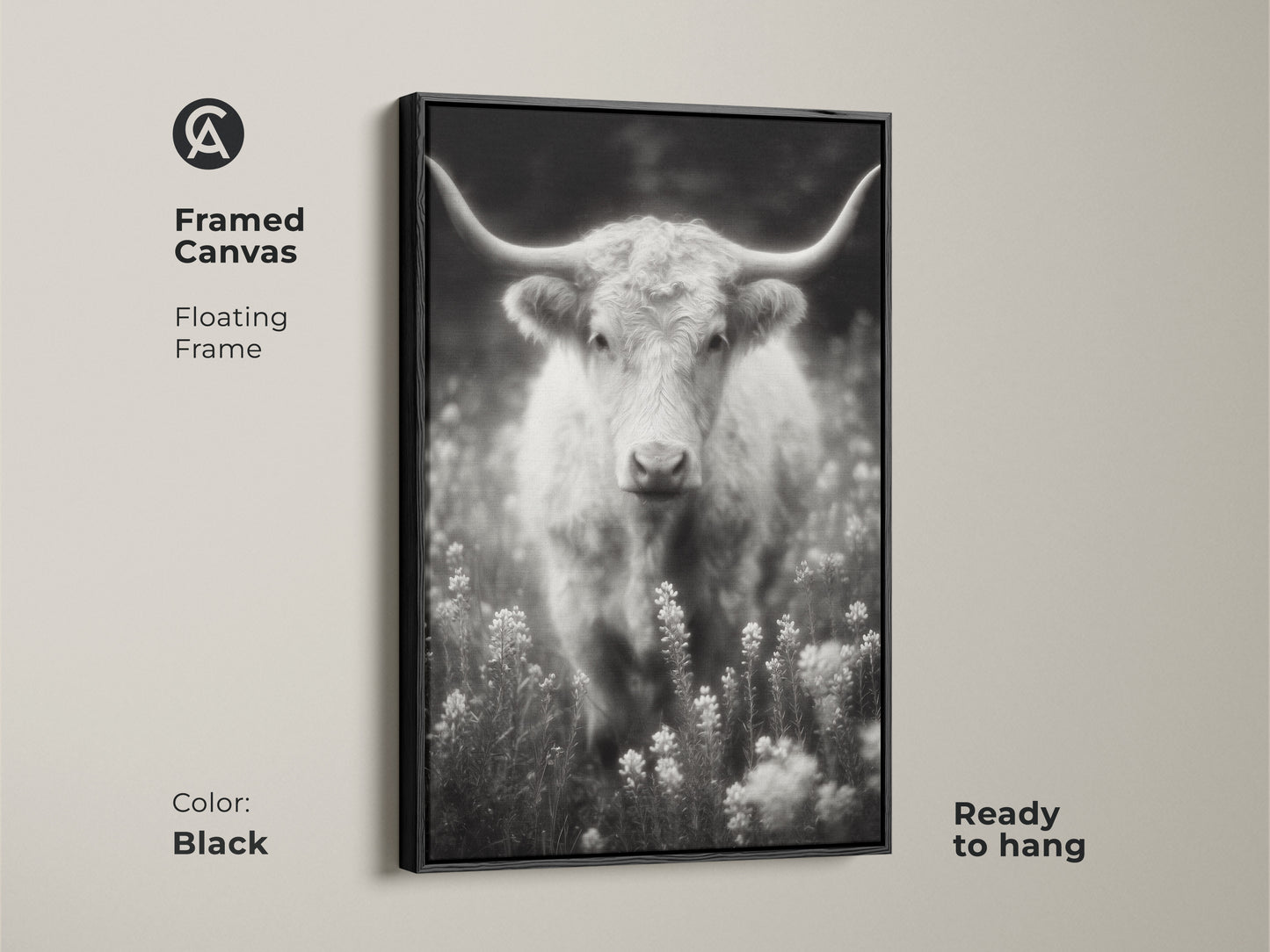 Black framed canvas featuring a longhorn in a field. The black and white artwork is ready to hang. The floating frame adds a modern touch. This fine art photograph is a statement piece for your home decor.