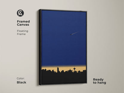 Framed Canvas featuring minimalist cityscape artwork. This modern skyline art print includes a floating frame. The deep blue wall art enhances any office. Geometric airplane wall decor that's ready to hang in black.