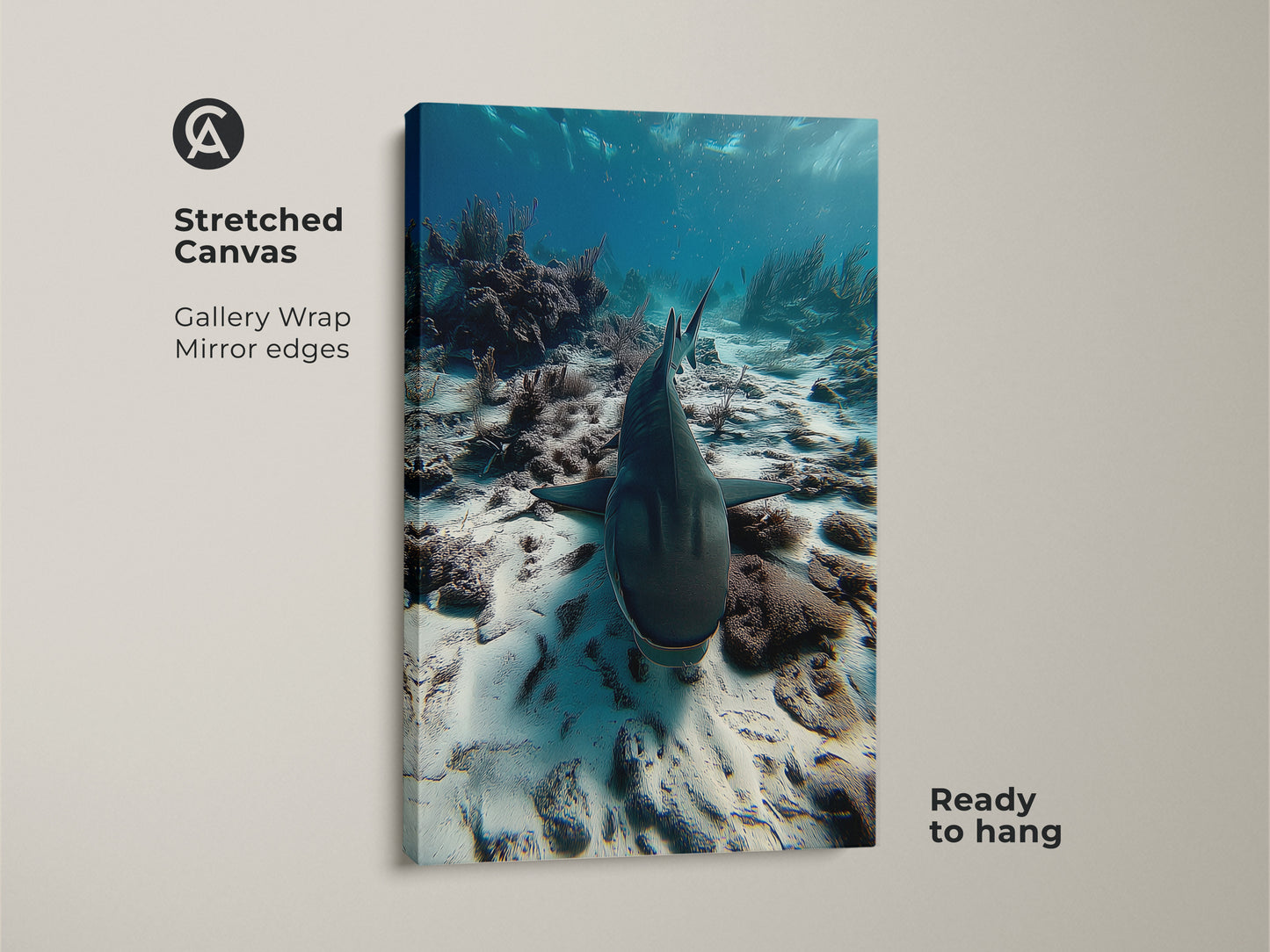 Stretched canvas of underwater shark artwork ready to hang. This photorealistic ocean print shows a shark swimming above a coral reef. The gallery wrap features mirror edges. This deep blue wildlife art is perfect as coastal home decor or a thoughtful housewarming gift for ocean lovers.
