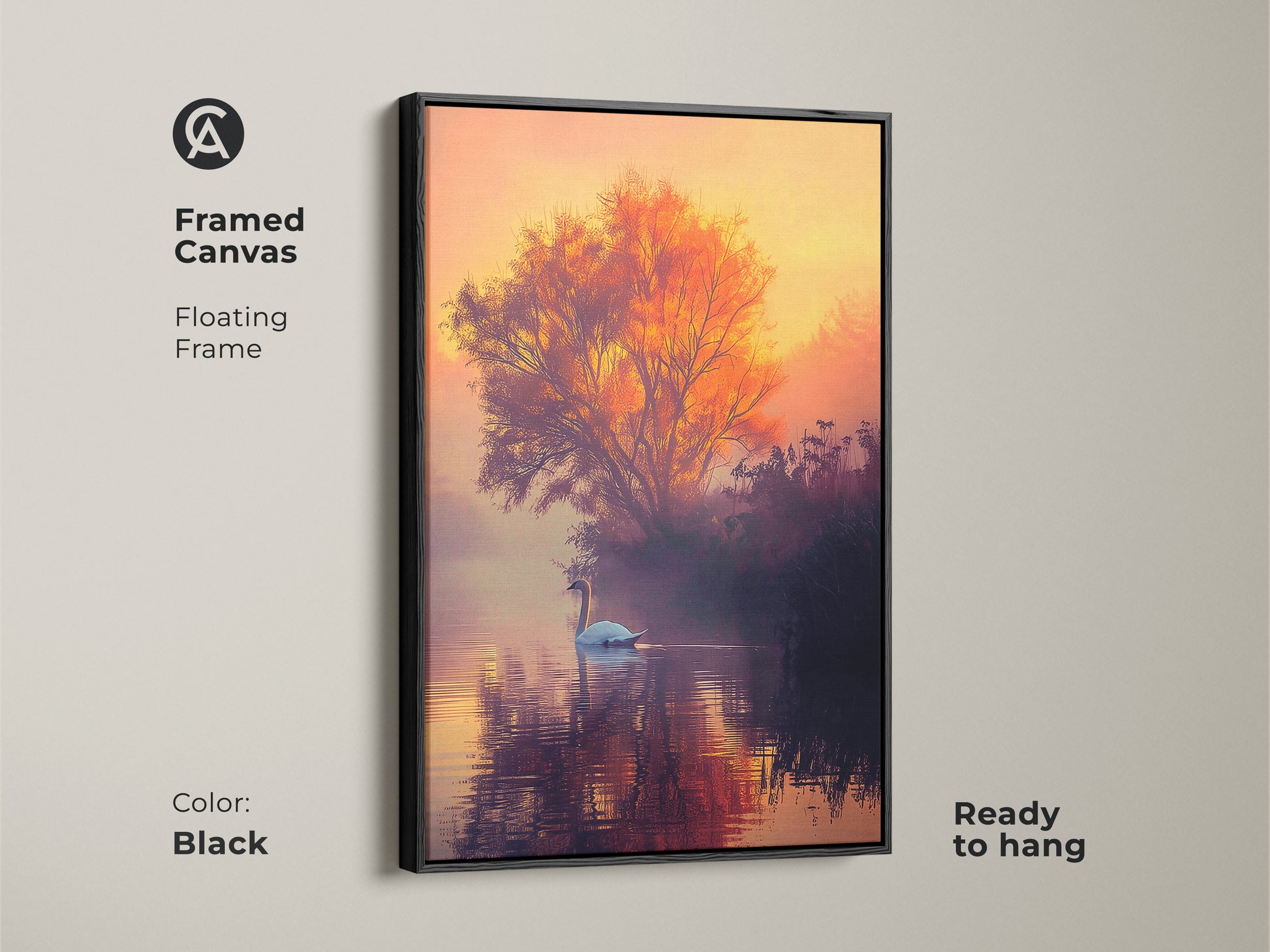 This framed canvas artwork features a tranquil lake scene in a black floating frame. The swan glides across the water in the fine art print. The warm sunset colors create a serene mood. A tree silhouette adds depth. This swan art print is perfect for adding peace to any room.