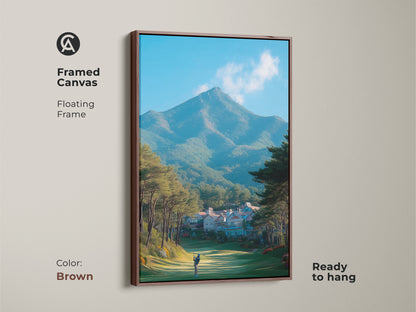 Framed canvas artwork showcasing a golfer on a lush golf course. The brown floating frame complements the natural scenery. A mountain backdrop and clear sky add depth. This ready to hang artwork brings a touch of nature indoors.