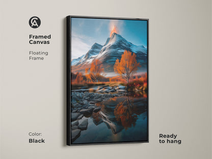Framed canvas of a snowy volcano mountain landscape with orange autumn trees reflected in a river. Black floating frame is ready to hang. It is an ideal rustic home decor. This art is a great housewarming gift. The natural beauty and scenic vista complements lodge-style interiors.