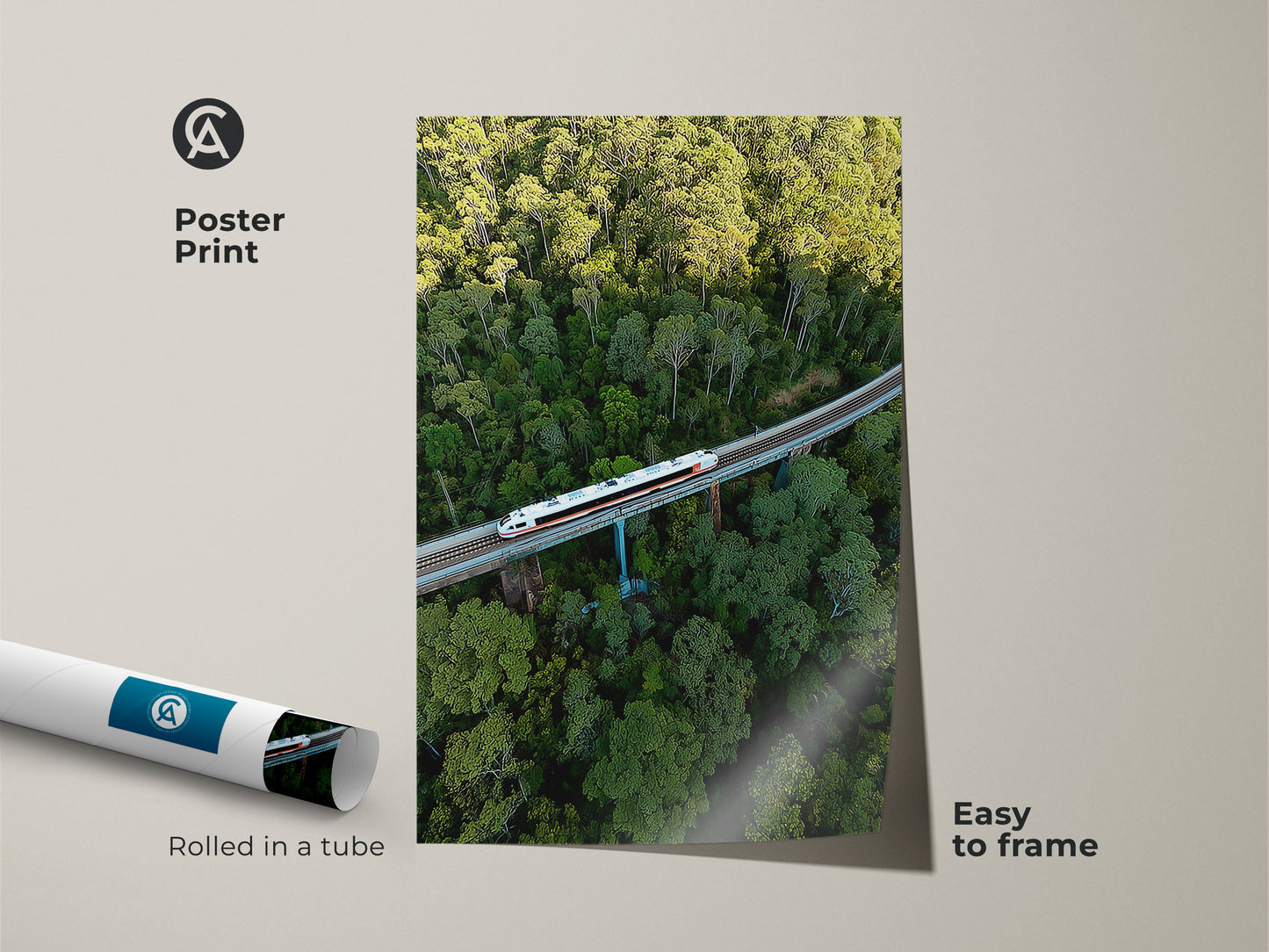 Poster print of an aerial train in a green forest. This modern transportation print is easy to frame. The rolled canvas showcases nature landscape art. This green nature photography is perfect for office wall decor. It's a unique wall hanging for travel enthusiasts.