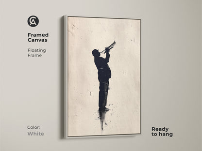 White framed canvas art of a jazz trumpet player. The floating frame enhances the silhouette artwork. Ready to hang for instant musical ambiance. Elevate your decor with this framed art.