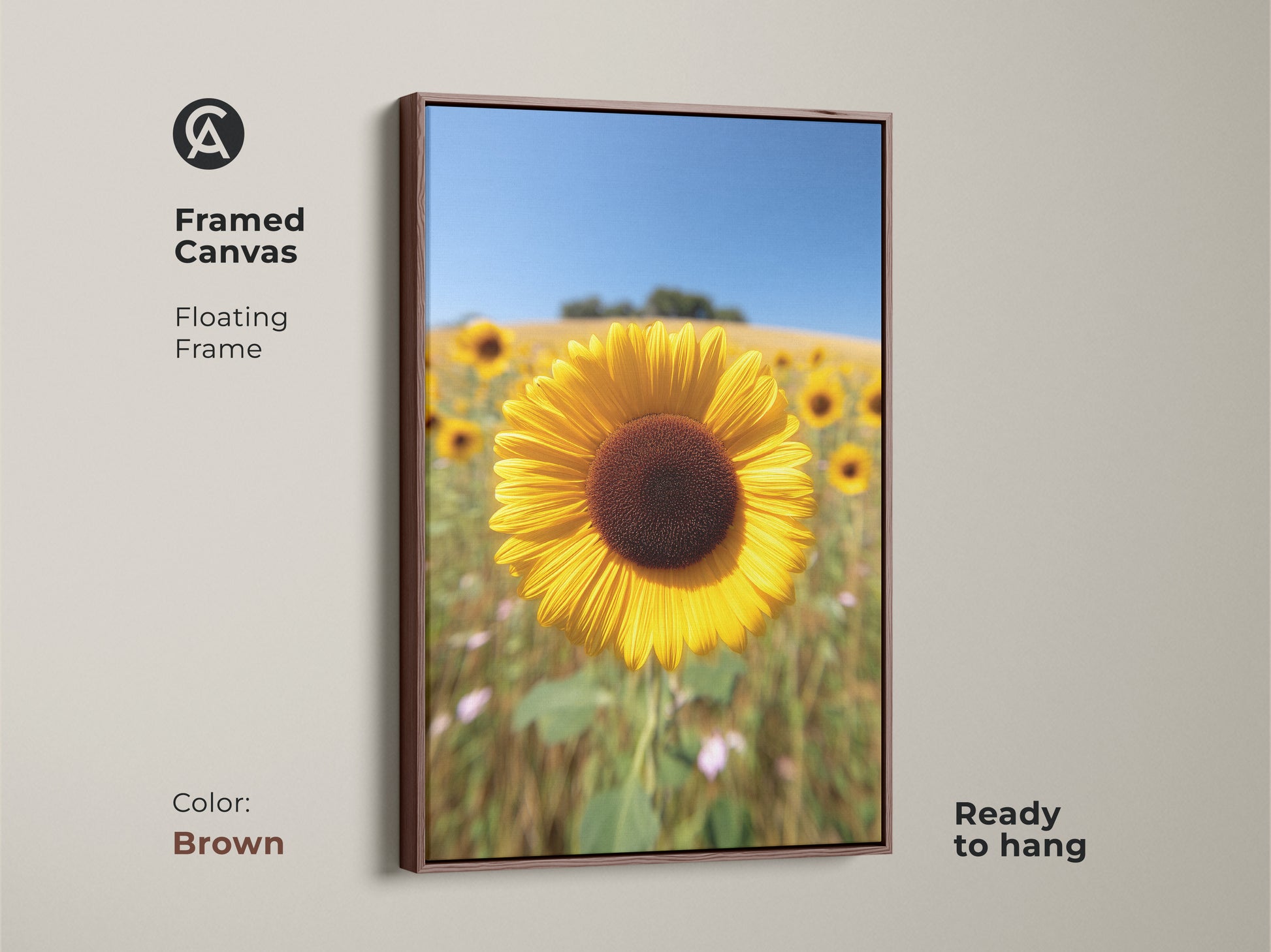 Framed canvas with a floating frame showcases a sunflower field artwork. The brown frame enhances the rustic farmhouse charm of this floral artwork. Ready to hang it brings a sunny day indoors. Perfect for farmhouse decor or a thoughtful gift for grandma.