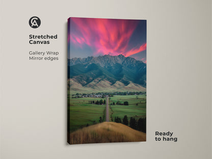 Stretched pink sunset mountain canvas art ready to hang. The gallery wrap with mirror edges enhances the landscape wall art. This modern farmhouse decor evokes a scenic bedroom wall. Perfect as a housewarming gift for outdoor lovers. Ideal for residential wall decor.