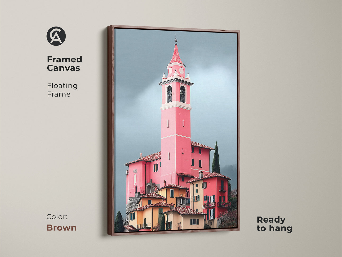 Framed canvas in brown showcases a pink church tower art print. Floating frame accentuates European village artwork. Italian architecture painting enriches travel inspired decor.