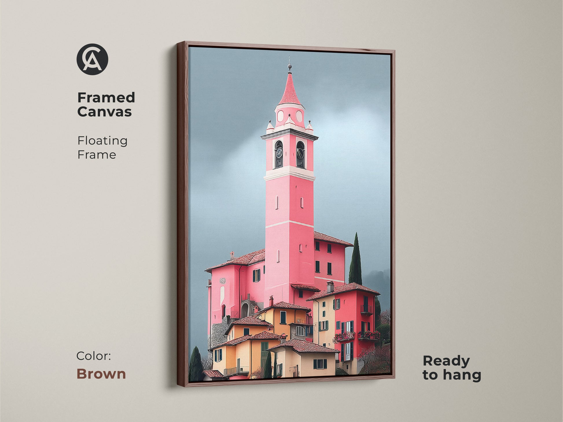 Framed canvas in brown showcases a pink church tower art print. Floating frame accentuates European village artwork. Italian architecture painting enriches travel inspired decor.